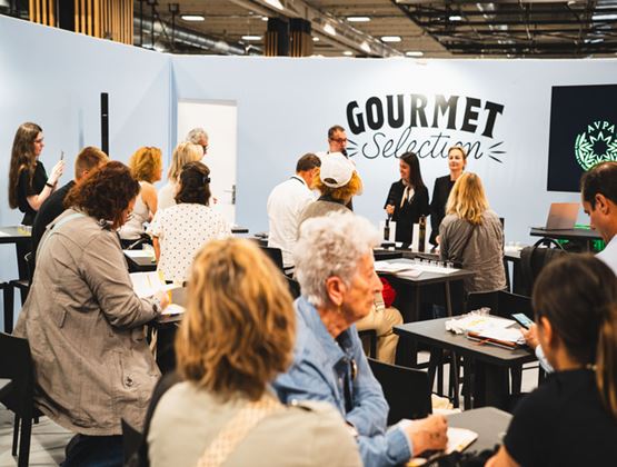 Professional workshop at Gourmet Selection 2026, with participants seated in front of speakers.