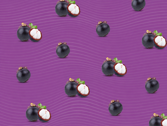 Mangosteens arranged on a purple patterned background, including whole and cut fruit showing the white flesh.