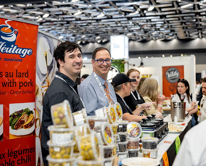 Exhibitors exhibiting new products and presenting to visitors