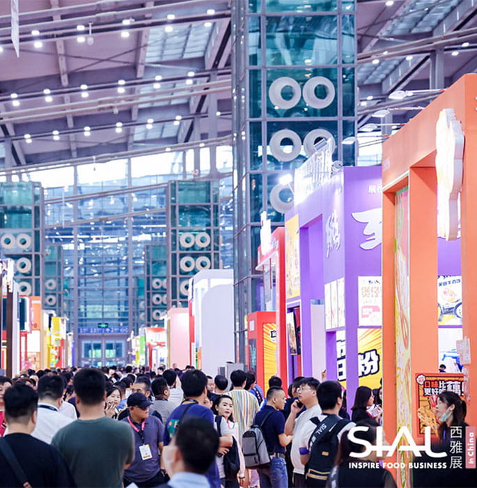 Visitors at the show walking discovering new products