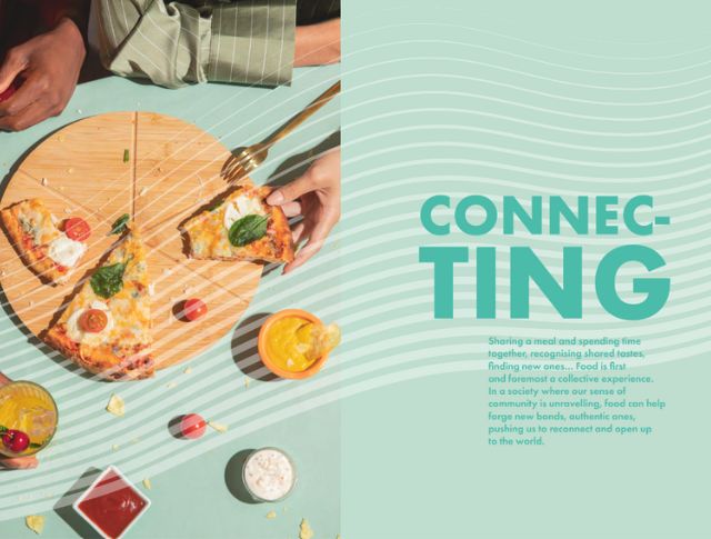 Two people sharing a pizza on a green table, surrounded by drinks and sauces, with the word “CONNECTING” and text about togetherness on the right side