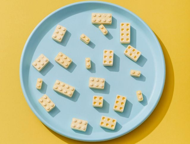 Food-shaped Lego bricks on a blue plate
